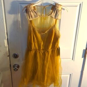 Satin dress with tulle overlay and satin bows